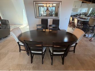 High quality dining table and 8 chairs, also selling 19 other quality furniture items to remodel