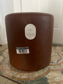 Brown ottoman chair