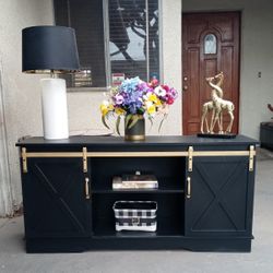 TV Stand With Sliding Farmhouse Doors And Shelves- Black With Gold 