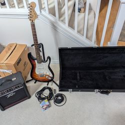 Fender Squier Stratocaster and Peavey amp