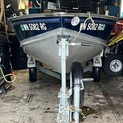 1998 Lund 14w/trailer 