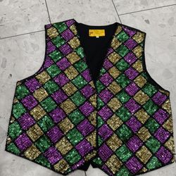 This vintage JC handmade sequin vest is a dressy, unisex garment