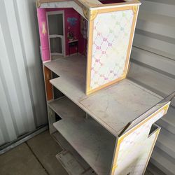 Very nice doll house with a box full of furniture and appliances