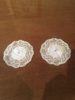 HAND MADE BELGIUM LACE COASTERS TO PUT WINE GLASSES ON OR TO USE UNDER PERFUMES OR VASES OF FLOWERS,