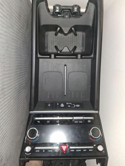 center console trim piece for a fifth-generation Hyundai Santa Fe (2024–2026 model