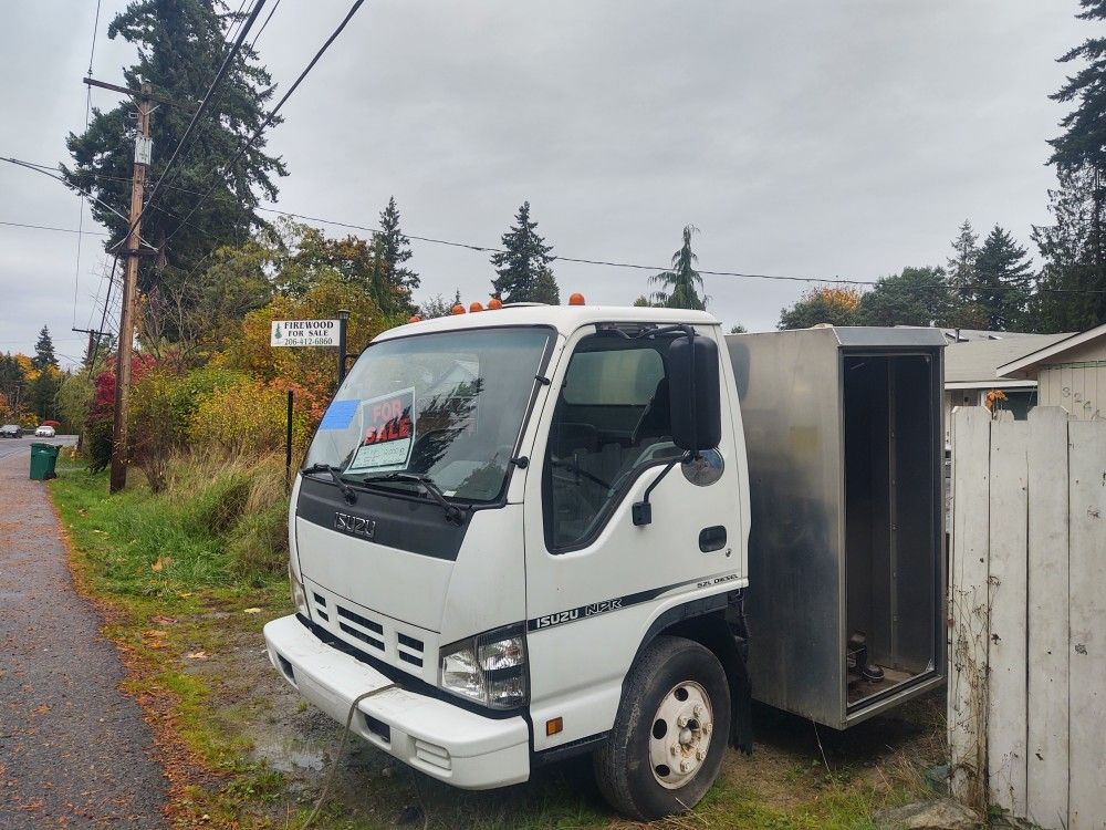 Isuzu Diesel With Dump Bed