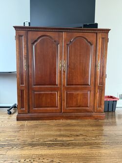Beautiful Wood Entertainment Center. UNDER PRICED