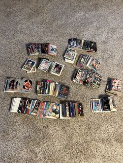 Hundreds of 90s sports cards baseball, football and basketball