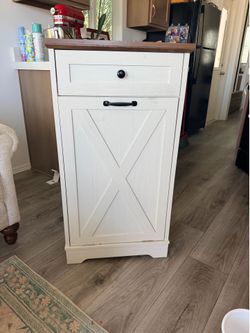Trash cabinet with drawer
