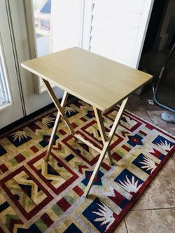 Folding multipurpose table