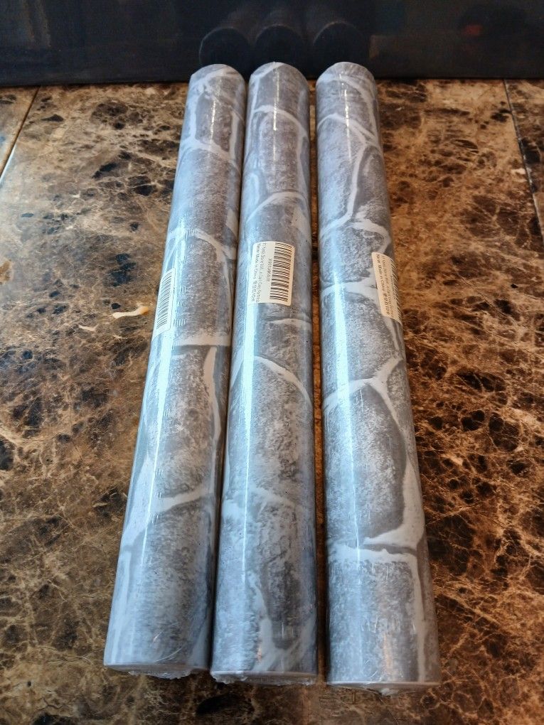 
New Stone Grey / Marble Wallpaper  3 Rolls 99yds Total

Introducing the new Stone Grey / Marble Wallpaper from Stonewall, featuring a marbled pattern