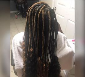 Hair braiding ( faux locs)