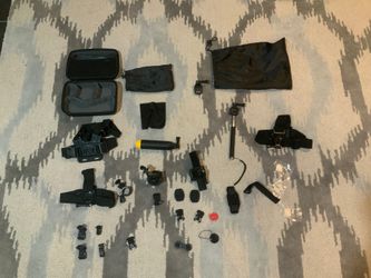 A bunch of gopro accessories and a case. Basically no wear on anything.