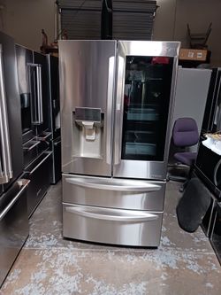 Refrigerator lg 4 door with fast door glass in stainless steel 40 days warranty Delevery