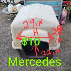 Used Dog House Has A Small Crack