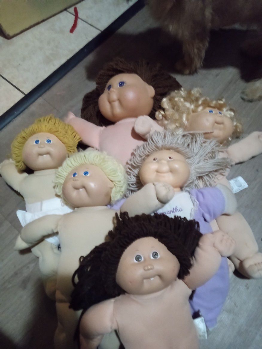 Six Cabbage Patch Dolls 