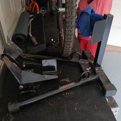 Trackside motorcycle holder