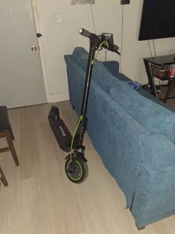 Black and Green Electric Scooter