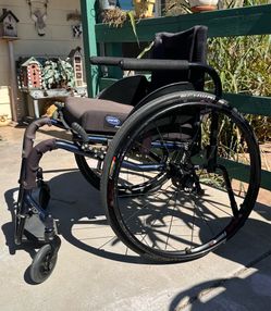 Manual ridged wheelchair