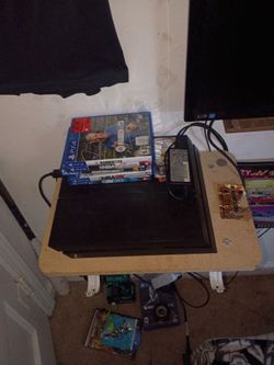 Sony PlayStation 4 Console with Games