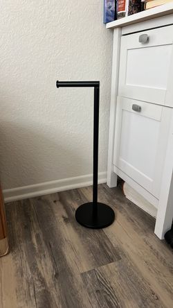 Toilet paper holder stand