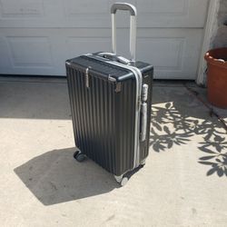 Suitcase  - Hardcase With Lock And On 4 Wheels