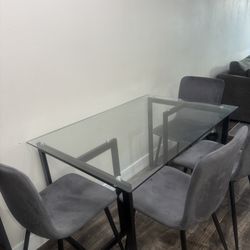Glass Table W/ Four Chairs