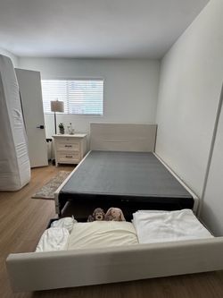 Tan soft queen bed frame with storage + mattress + bunkie board