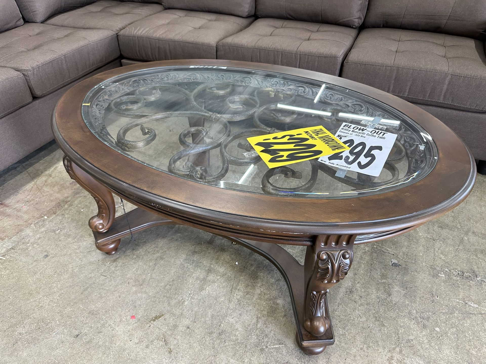 COFFEE TABLE SALE! BRAND NEW Ashley Norcastle Oval Coffee Table - 48”x 34” (Reg. $375) ASSEMBLED FREE!