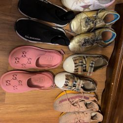 6 Pairs Of Kids Shoes, Gucci, Burberry, Yeezy And DG  Golden Goose are new Sz 1 Asking 130