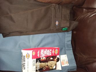 2 pairs dickies pants NEW BOTH PAIRS FOR 10$