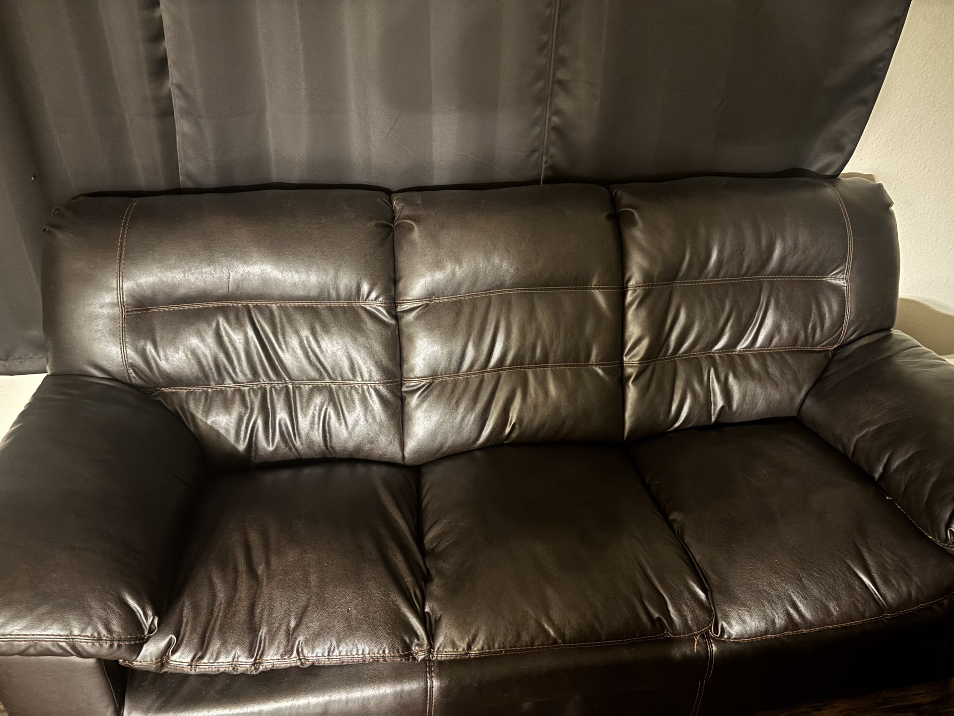Ashely’s Leather Brown Couches 2x