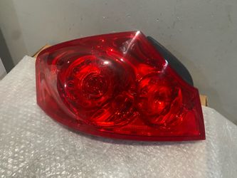 2007-2013 Infiniti G37 left tail light