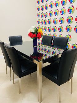 Contemporary Black Glass Dining Table with Leather Seating