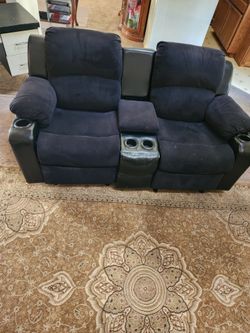 Console loveseat rocker recliners.