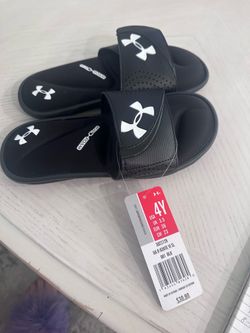 Brand new Under Armor youth slides size4Y.
