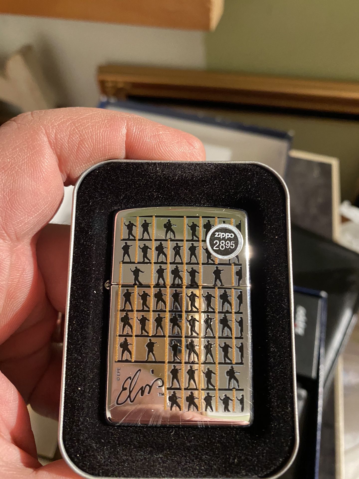 Vintage Zippo Elvis lighter. Original price still attached.