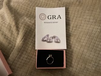 1 CT Moissanite stud ring set in  .925 sterling silver