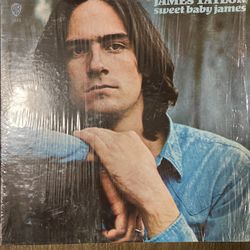 Vintage James Taylor Album And Music Book