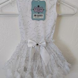 Baby dress brand new with tags size small 1 yrs old.