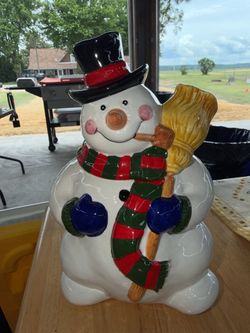 Boston Warehouse Snowman Cookie Jar  Small Jar Black Hat Striped Scarf 10". Batteries are corroded not sure if they are cleaved up if it works still