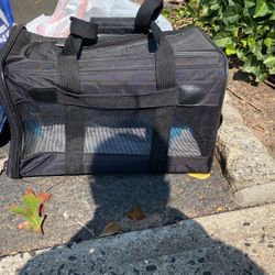 Pet Carrier And Dog Clothing Bundle