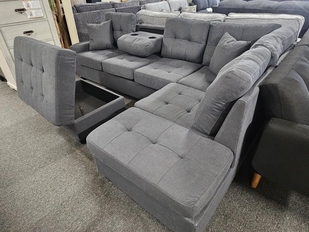 Brand New Gray Linen Reversible Sectional With Cup Holders + Storage Ottoman