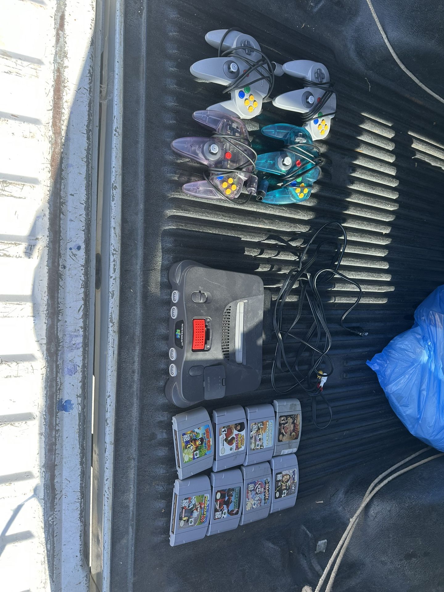 Nintendo 64 With Four Controllers And 8 Games