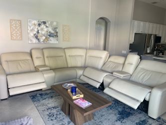 Jonathan and Drew rooms to go leather sectional with reclining seat seats