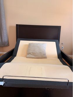 Queen size bed frame, and electronic head and foot lift.