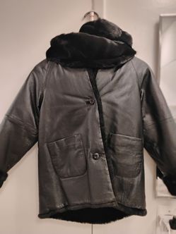 young girls fur lined coat. size 10/12