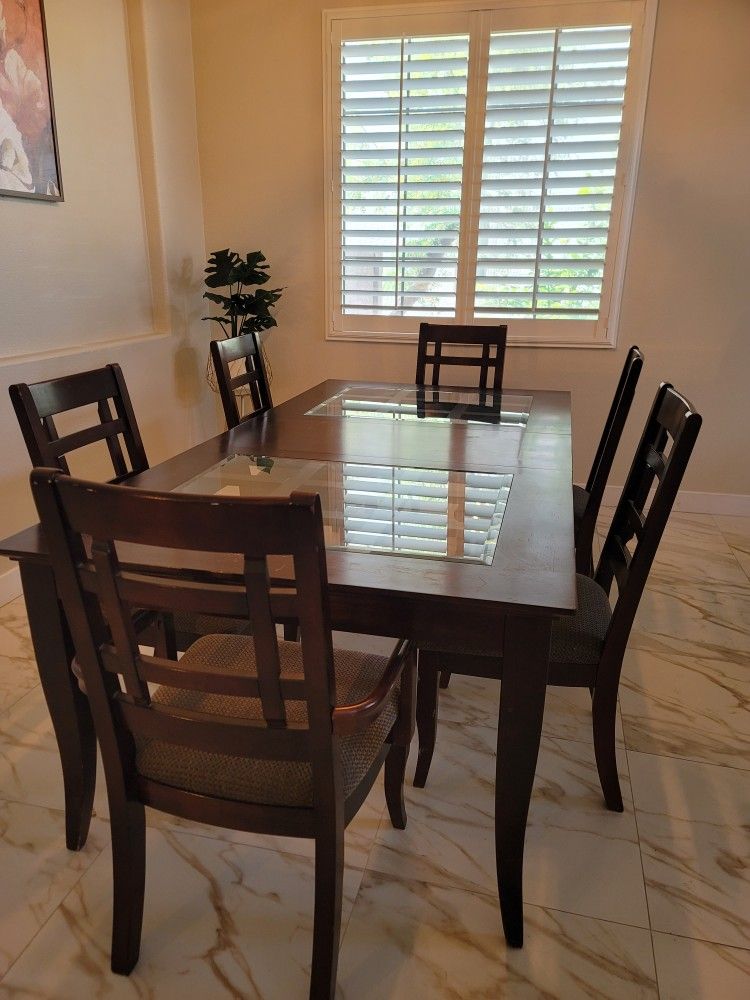 Solid 6 seat dining room table and chairs
