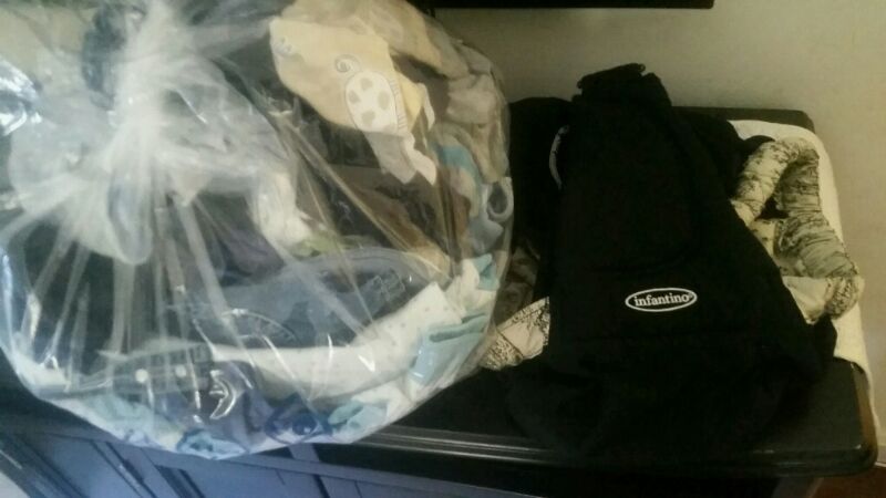 Big bag of baby boy clothes w/ infant carrier