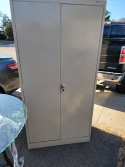 Tensco metal storage cabinet